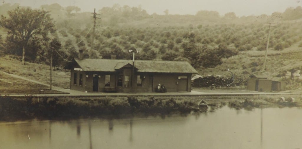 Train Depot Lecompton with orchard in background